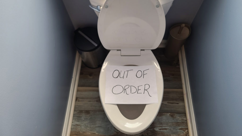 top down view of toilet with out of order sign on top clarksville tn